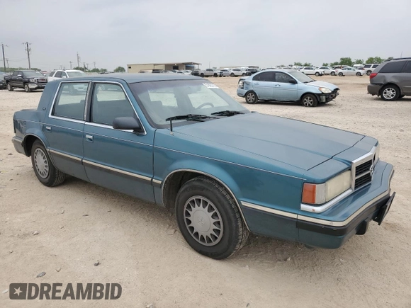 1993 Dodge Dynasty LE z VIN 1B3XC56R3PD124521, wystawiony jako Copart lot #51825725 z przebiegiem 94 336 mil mil oraz Szkoda całkowita • Salvage title. Historia ofert i sprzedaży dostępna na DreamBid. Obrazek 4.