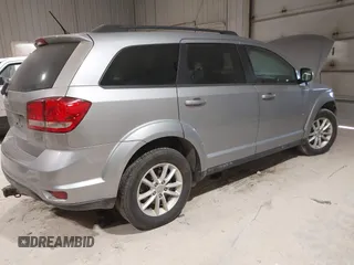 2015 Dodge Journey SXT with VIN 3C4PDDBG4FT544162, listed as a IAAI auction lot 41320028 with 128,475 mi miles and . Bid and sale history available at DreamBid. Image 4.