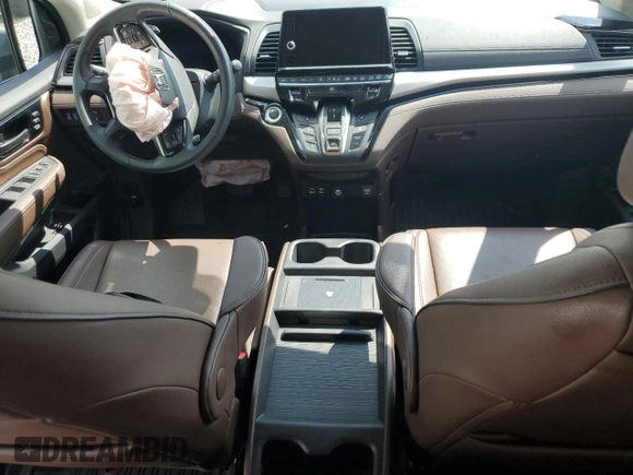 2025 Honda Odyssey Touring with VIN 5FNRL6H87SB001792, listed as a Copart auction lot 51049255 with Not provided miles and Salvage title. Bid and sale history available at DreamBid. Image 8.