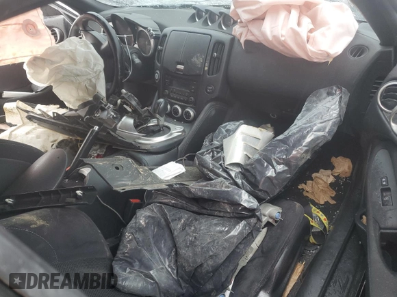 2017 Nissan 370Z z VIN JN1AZ4EH7HM952775, wystawiony jako Copart lot #81940704 z przebiegiem Nie podano mil oraz Szkoda całkowita • Salvage title. Historia ofert i sprzedaży dostępna na DreamBid. Obrazek 8.