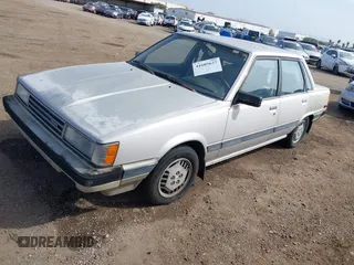 1985 Toyota Camry z VIN JT2SV16E9F0351378, wystawiony jako IAAI lot #41605627 z przebiegiem 192 476 mil mil oraz . Historia ofert i sprzedaży dostępna na DreamBid. Obrazek 2.