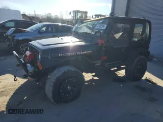 2004 Jeep Wrangler Rubicon with VIN 1J4FA69S74P785297, listed as a Copart auction lot 47332944 with 61,323 mi miles and Salvage Title. Bid and sale history available at carsss.com. Image 1.