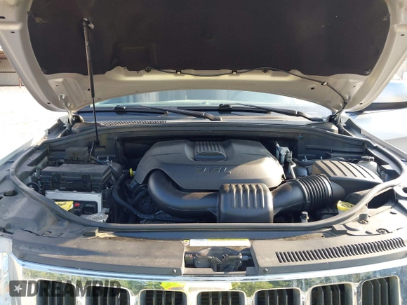 2011 Jeep Grand Cherokee Laredo with VIN 1J4RR4GG2BC514497, listed as a IAAI auction lot 42688206 with 88,822 mi miles and . Bid and sale history available at DreamBid. Image 10.