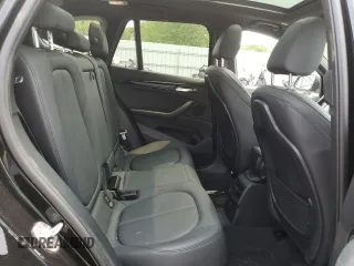 2018 BMW X1 xDrive28i with VIN WBXHT3C36J3H29952, listed as a Copart auction lot 59679285 with 75,220 mi miles and Salvage title. Bid and sale history available at DreamBid. Image 11.