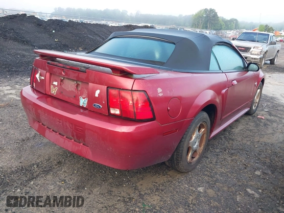 2004 Ford Mustang Deluxe with VIN 1FAFP44604F212319, listed as a IAAI auction lot 42100591 with 191,992 mi miles. Bid and sale history available at carsss.com. Image 4.