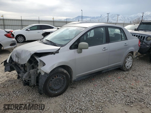 2011 Nissan Versa S with VIN 3N1BC1AP5BL443156, listed as a Copart auction lot 43229085 with 111,165 mi miles and Salvage title. Bid and sale history available at DreamBid. Image 1.