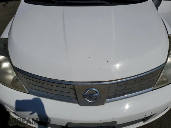 2009 Nissan Versa 1.8 S with VIN 3N1BC11E49L371066, listed as a Copart auction lot 57502474 with 157,127 mi miles and Salvage Title. Bid and sale history available at carsss.com. Image 11.