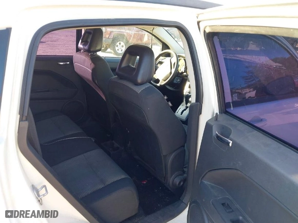 2009 Dodge Caliber SXT with VIN 1B3HB48A99D107704, listed as a IAAI auction lot 41742363 with 1 mi miles. Bid and sale history available at carsss.com. Image 8.