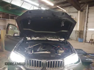 2018 BMW X5 xDrive35i with VIN 5UXKR0C53J0Y03214, listed as a IAAI auction lot 41509082 with 92,552 mi miles. Bid and sale history available at carsss.com. Image 10.