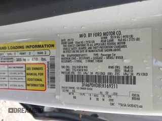 2014 Ford Fusion SE with VIN 3FA6P0HD8ER169211, listed as a IAAI auction lot 42038877 with 215,769 mi miles. Bid and sale history available at carsss.com. Image 9.