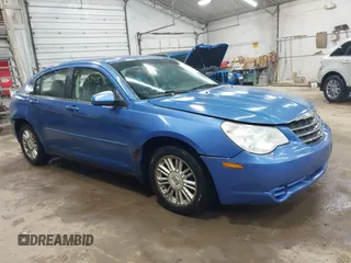 2007 Chrysler Sebring Touring z VIN 1C3LC56K57N508248, wystawiony jako IAAI lot #42305748 z przebiegiem 174 621 mil mil oraz . Historia ofert i sprzedaży dostępna na DreamBid. Obrazek 1.
