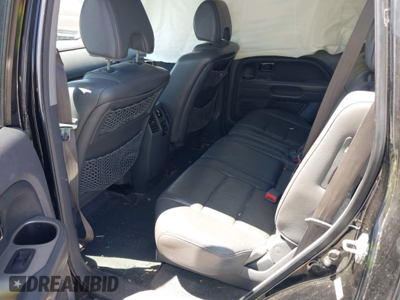 2008 Honda Pilot EX-L with VIN 5FNYF28728B020701, listed as a IAAI auction lot 42551294 with 136,860 mi miles and . Bid and sale history available at DreamBid. Image 8.