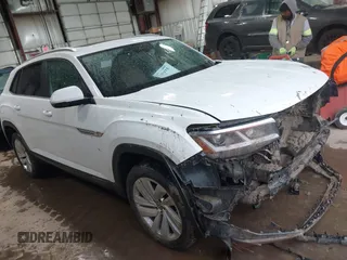 2021 Volkswagen Atlas SE with VIN 1V2KC2CA5MC222648, listed as a IAAI auction lot 41948975 with 82,833 mi miles and . Bid and sale history available at DreamBid. Image 1.