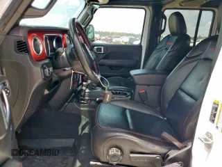 2021 Jeep Wrangler Unlimited Rubicon with VIN 1C4JJXFG1MW849460, listed as a Copart auction lot 62701895 with 54,517 mi miles and Salvage title. Bid and sale history available at DreamBid. Image 7.