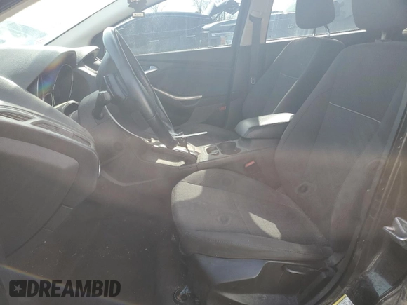 2012 Ford Focus SEL with VIN 1FAHP3H20CL329098, listed as a Copart auction lot 46990485 with 131,783 mi miles and Salvage Title. Bid and sale history available at DreamBid. Image 7.