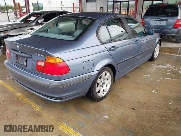 2000 BMW 3 Series 323i with VIN WBAAM334XYCB24411, listed as a IAAI auction lot 42112597 with 94,813 mi miles and . Bid and sale history available at carsss.com. Image 4.