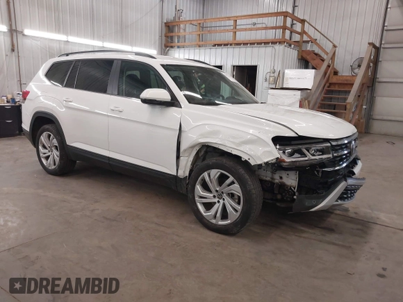 2021 Volkswagen Atlas SE z VIN 1V2HR2CA3MC539997, wystawiony jako IAAI lot #41977786 z przebiegiem 77 372 mil mil oraz . Historia ofert i sprzedaży dostępna na DreamBid. Obrazek 1.