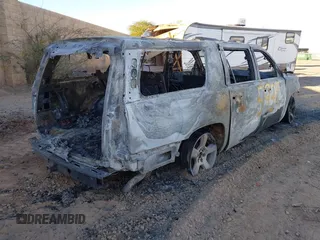 2019 Chevrolet Suburban LT with VIN 1GNSCHKC2KR395939, listed as a IAAI auction lot 41407596 with Not Provided miles and . Bid and sale history available at DreamBid. Image 4.
