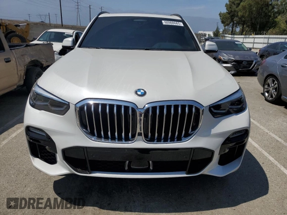 2019 BMW X5 xDrive40i with VIN 5UXCR6C57KLK85504, listed as a Copart auction lot 60908665 with 21,333 mi miles and Salvage title. Bid and sale history available at DreamBid. Image 5.