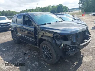 2017 Jeep Grand Cherokee Laredo with VIN 1C4RJFAG7HC892261, listed as a IAAI auction lot 42409909 with 146,788 mi miles and . Bid and sale history available at DreamBid. Image 1.