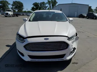 2013 Ford Fusion SE Hybrid z VIN 3FA6P0LU6DR325719, wystawiony jako Copart lot #55777715 z przebiegiem 152 478 mil mil oraz Szkoda całkowita • Salvage title. Historia ofert i sprzedaży dostępna na DreamBid. Obrazek 5.