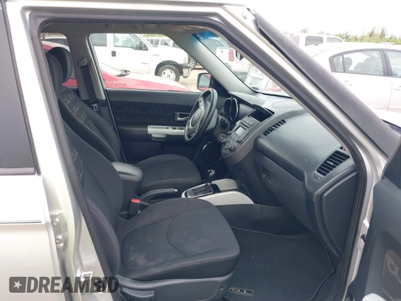 2012 Kia Soul + with VIN KNDJT2A60C7377305, listed as a IAAI auction lot 41902069 with 76,217 mi miles. Bid and sale history available at carsss.com. Image 5.