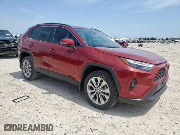 2022 Toyota RAV4 XLE Premium with VIN 2T3C1RFV7NW234284, listed as a Copart auction lot 57142325 with 21,580 mi miles and Salvage title. Bid and sale history available at DreamBid. Image 4.