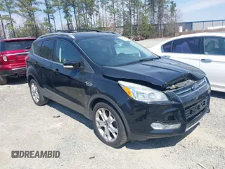 2016 Ford Escape Titanium with VIN 1FMCU0JX8GUC06601, listed as a IAAI auction lot 41785774 with 121,427 mi miles. Bid and sale history available at carsss.com. Image 1.