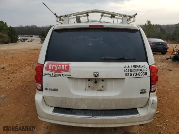 2012 Ram Cargo Van with VIN 2C4JDGAG8CR340150, listed as a Copart auction lot 43041175 with 253,007 mi miles and Salvage Title. Bid and sale history available at carsss.com. Image 6.