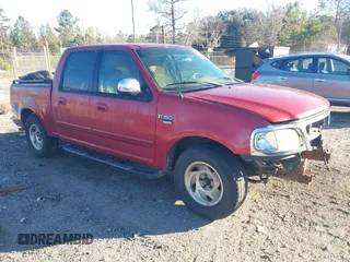2002 Ford F-150 XLT with VIN 1FTRW07632KD28679, listed as a IAAI auction lot 41586293 with 1 mi miles. Bid and sale history available at carsss.com. Image 1.