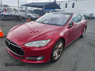 2013 Tesla Model S with VIN 5YJSA1DN6DFP26504, listed as a IAAI auction lot 41703859 with 135,552 mi miles. Bid and sale history available at carsss.com. Image 1.