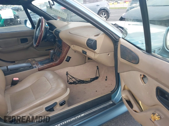 1999 BMW Z3 2.5 z VIN 4USCH9339XLG00523, wystawiony jako IAAI lot #42471650 z przebiegiem 180 985 mil mil oraz . Historia ofert i sprzedaży dostępna na DreamBid. Obrazek 5.