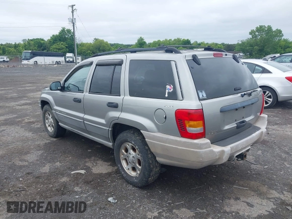 2000 Jeep Grand Cherokee Laredo with VIN 1J4GW48N9YC191779, listed as a IAAI auction lot 42378307 with 224,836 mi miles and . Bid and sale history available at DreamBid. Image 3.