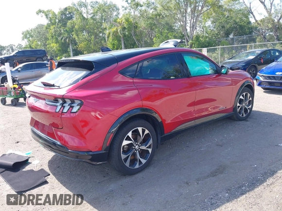 2023 Ford Mustang Mach-E Premium with VIN 3FMTK3SU7PMA97466, listed as a IAAI auction lot 42042779 with 11,016 mi miles and . Bid and sale history available at DreamBid. Image 4.