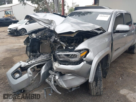 2023 Toyota Tacoma SR5 z VIN 3TMDZ5BN2PM164497, wystawiony jako IAAI lot #42034519 z przebiegiem 25 451 mil mil oraz . Historia ofert i sprzedaży dostępna na DreamBid. Obrazek 6.