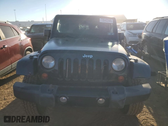 2011 Jeep Wrangler Sahara with VIN 1J4GA5D16BL567739, listed as a Copart auction lot 73542244 with 282,392 mi miles and Non Repairable. Bid and sale history available at DreamBid. Image 5.