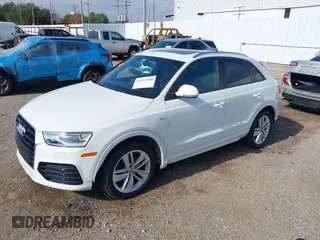 2018 Audi Q3 Premium with VIN WA1BCCFS8JR001155, listed as a IAAI auction lot 41157028 with 83,769 mi miles. Bid and sale history available at carsss.com. Image 22.