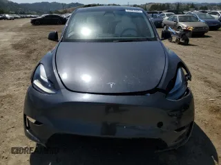 2024 Tesla Model Y Performance z VIN 7SAYGDEF0RF024089, wystawiony jako Copart lot #53981865 z przebiegiem Nie podano mil oraz Szkoda całkowita • Salvage title. Historia ofert i sprzedaży dostępna na DreamBid. Obrazek 5.