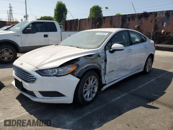 2017 Ford Fusion Hybrid SE z VIN 3FA6P0LU2HR209228, wystawiony jako Copart lot #62518055 z przebiegiem 119 174 mil mil oraz Szkoda całkowita • Salvage title. Historia ofert i sprzedaży dostępna na DreamBid. Obrazek 1.