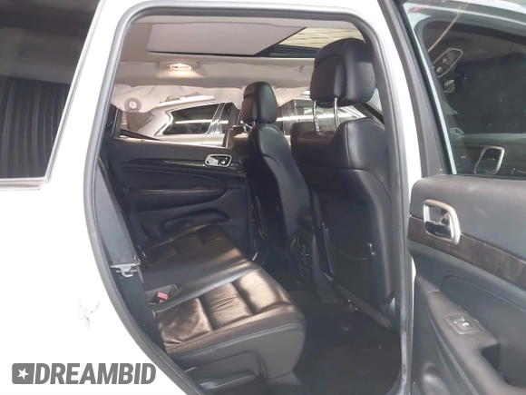 2013 Jeep Grand Cherokee Laredo with VIN 1C4RJFAG9DC532919, listed as a IAAI auction lot 40918828 with 140,093 mi miles. Bid and sale history available at carsss.com. Image 8.