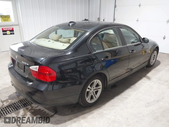 2008 BMW 3 Series 328xi with VIN WBAVC93538K043317, listed as a IAAI auction lot 41544348 with 127,823 mi miles. Bid and sale history available at carsss.com. Image 4.
