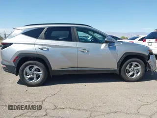 2023 Hyundai Tucson SEL z VIN 5NMJBCAE7PH239761, wystawiony jako IAAI lot #42159276 z przebiegiem 24 400 mil mil oraz . Historia ofert i sprzedaży dostępna na DreamBid. Obrazek 13.