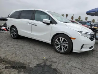 2021 Honda Odyssey Touring with VIN 5FNRL6H84MB027804, listed as a Copart auction lot 50535175 with 28,750 mi miles and Salvage Title. Bid and sale history available at carsss.com. Image 4.