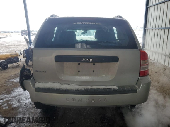 2010 Jeep Compass Sport with VIN 1J4NF4FB6AD521894, listed as a Copart auction lot 46027325 with 149,230 mi miles and Salvage Title. Bid and sale history available at carsss.com. Image 6.