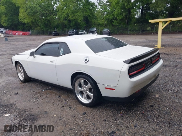 2015 Dodge Challenger SXT with VIN 2C3CDZAG2FH701634, listed as a IAAI auction lot 42242521 with 153,379 mi miles and . Bid and sale history available at DreamBid. Image 3.