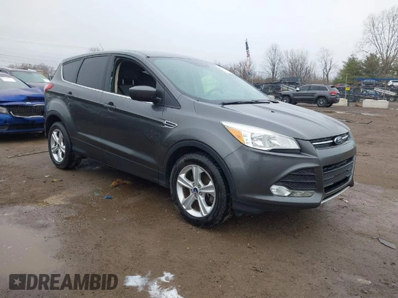2015 Ford Escape SE with VIN 1FMCU9G96FUB90684, listed as a IAAI auction lot 41832982 with 127,900 mi miles. Bid and sale history available at carsss.com. Image 1.