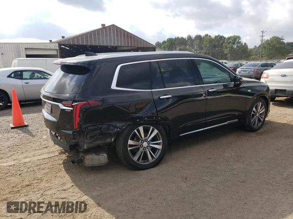 2020 Cadillac XT6 FWD Premium Luxury with VIN 1GYKPCRS6LZ102682, listed as a Copart auction lot 56906645 with 76,884 mi miles and Salvage title. Bid and sale history available at DreamBid. Image 3.