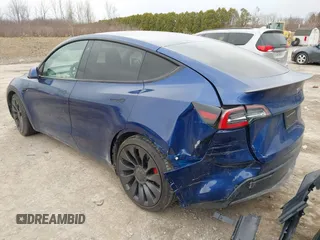 2020 Tesla Model Y Long Range with VIN 5YJYGDEF0LF000380, listed as a IAAI auction lot 41867489 with 66,294 mi miles and . Bid and sale history available at DreamBid. Image 3.