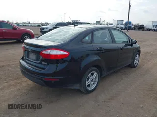 2018 Ford Fiesta SE z VIN 3FADP4BJ0JM139172, wystawiony jako IAAI lot #41212242 z przebiegiem 160 238 mil mil oraz . Historia ofert i sprzedaży dostępna na DreamBid. Obrazek 4.