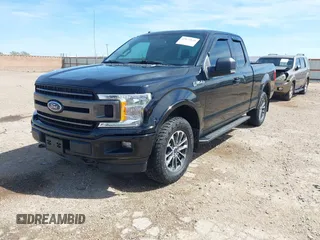 2018 Ford F-150 XL with VIN 1FTEX1EP7JFC21008, listed as a IAAI auction lot 42072145 with 102,679 mi miles and . Bid and sale history available at DreamBid. Image 2.